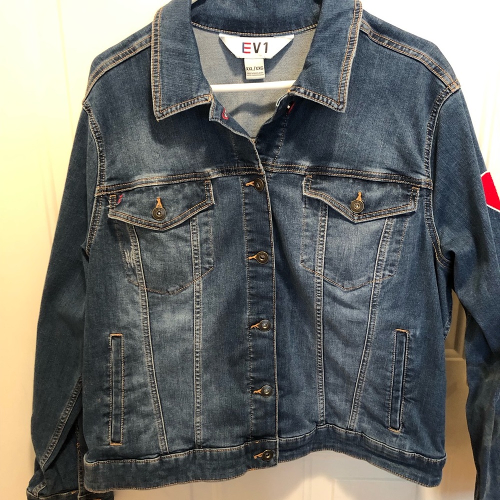 Slightly distressed Jean jacket.
